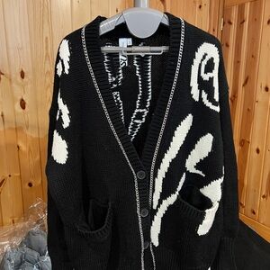 45.6% sheep wool Women's Sweater. New without tag!